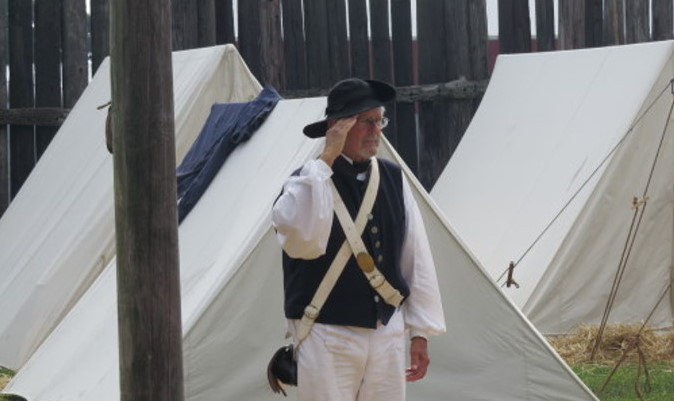 "Saluting the flag during the National Anthem"